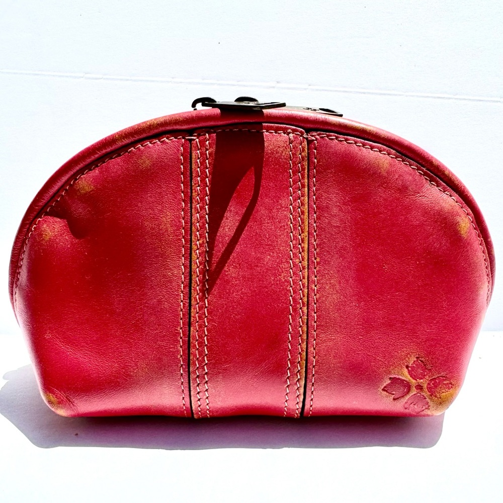 Particia Nash leather pink top zip clutch